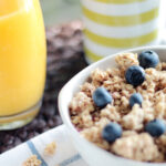 Canva - Bowl of Oatmeal With Berries Beside Glass of Juice