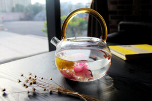 Canva - Transparent Teapot with Flowers